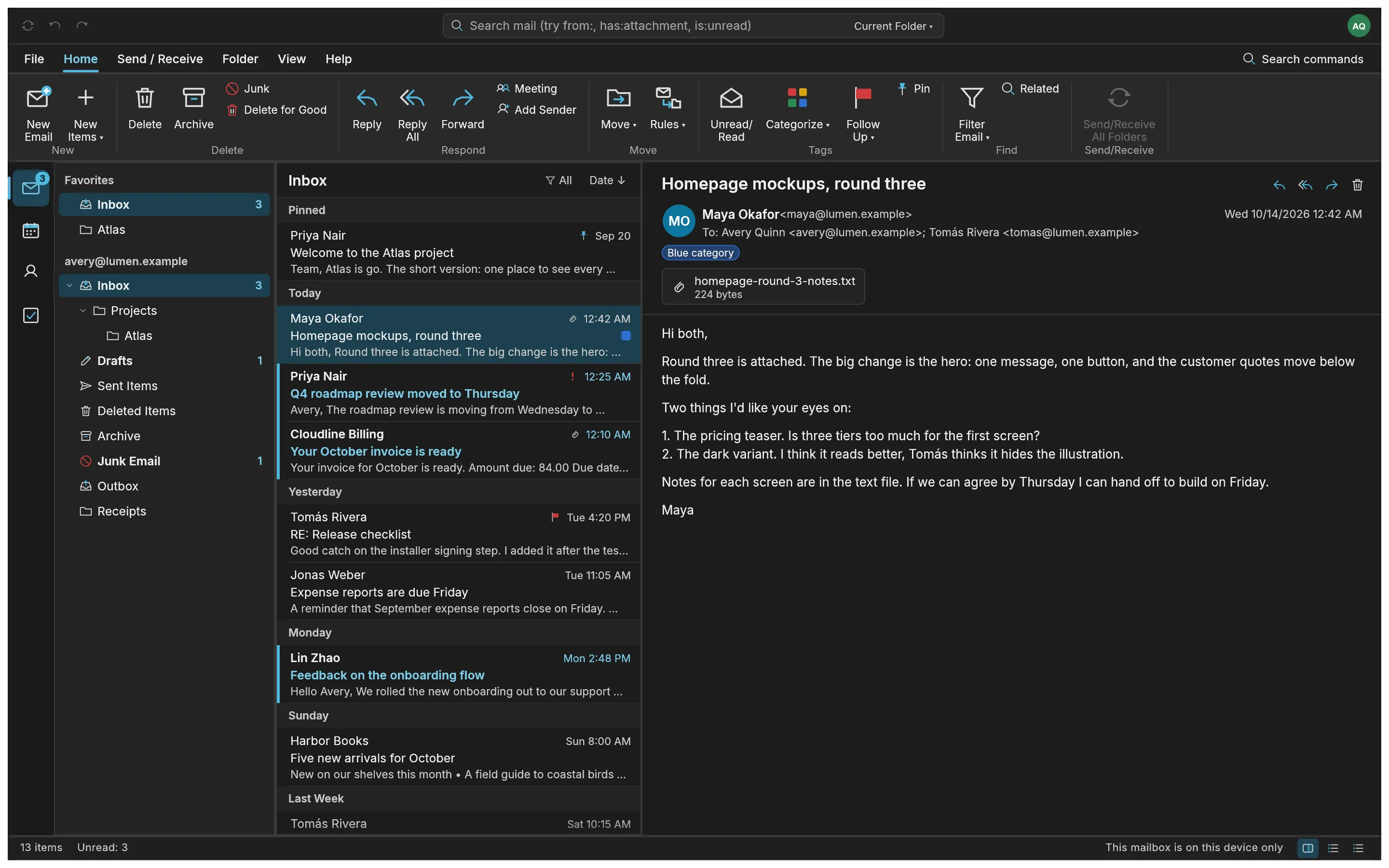 The Inbox in dark mode, with the ribbon, folders, message list and reading pane.